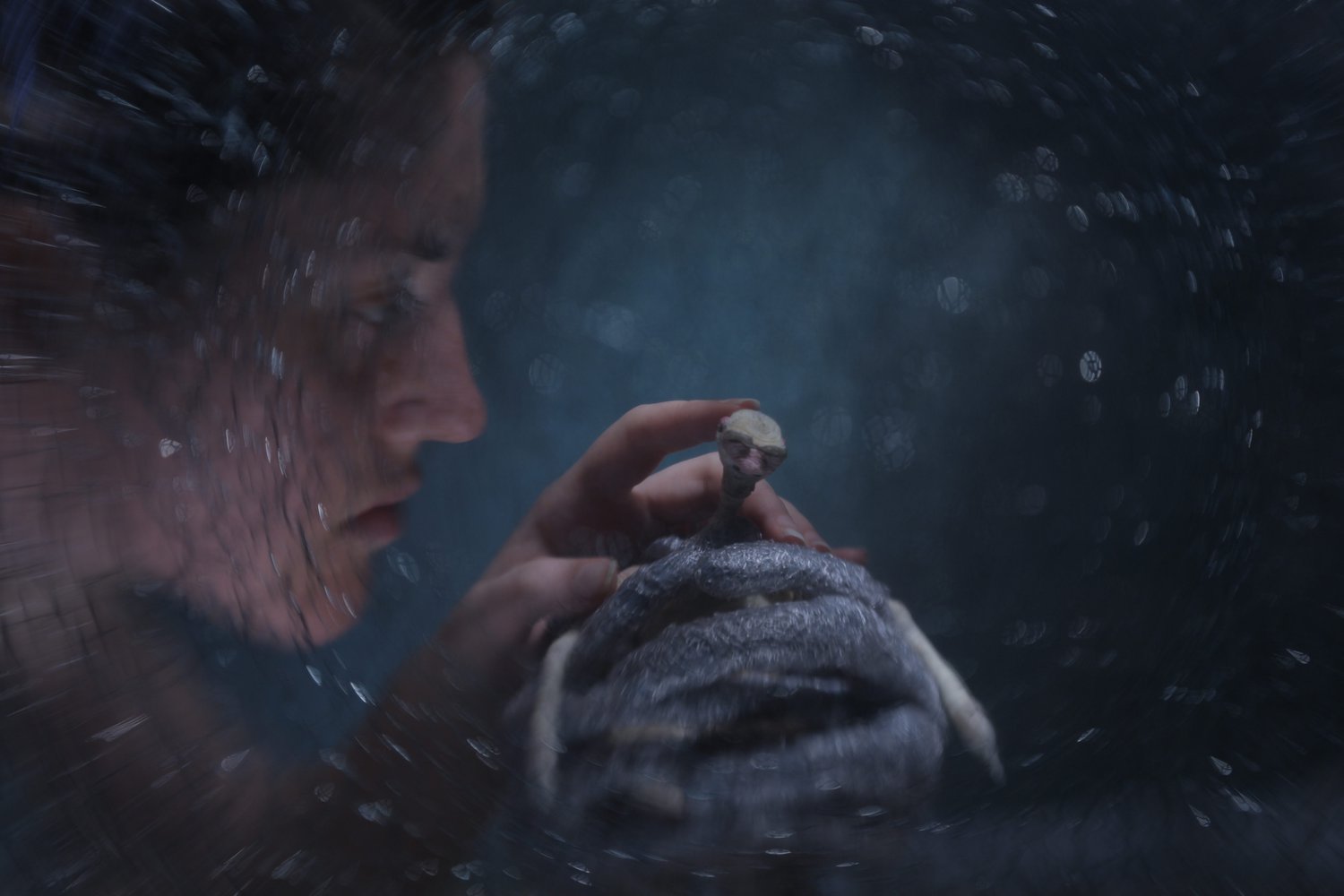 Old Man in the grasp of a great monster.