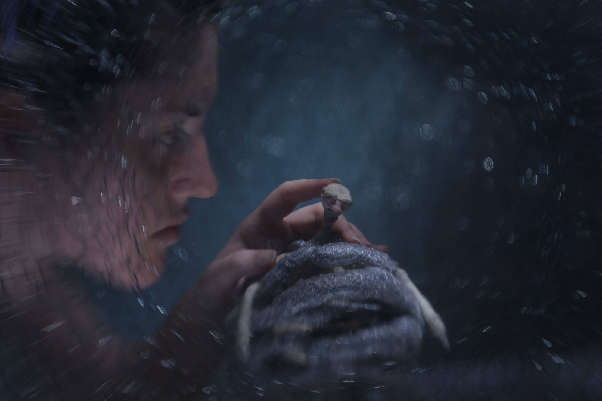 Old Man in the grasp of a great monster.
