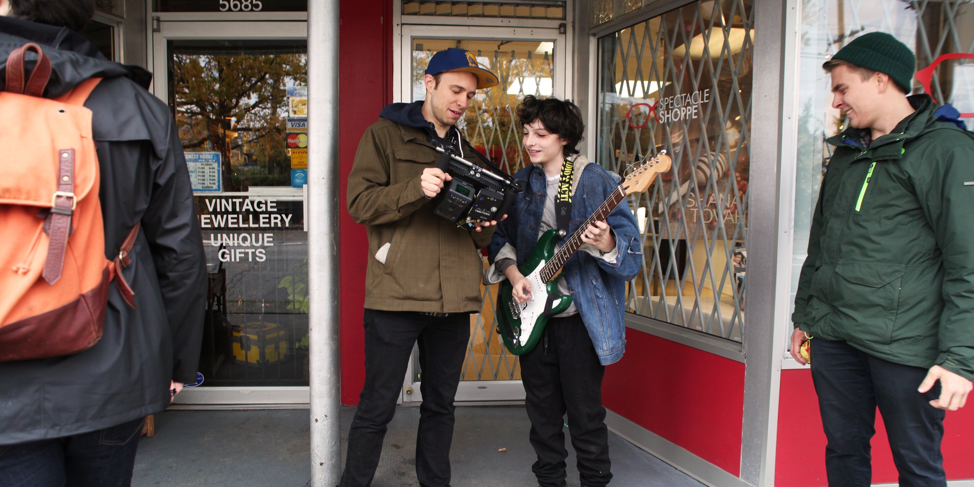 Director Jeremy and Finn reviewing a take