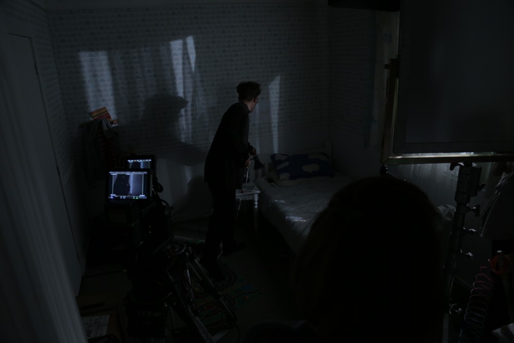 Cinematographer Jeremy Cox setting up for a nighttime shot.